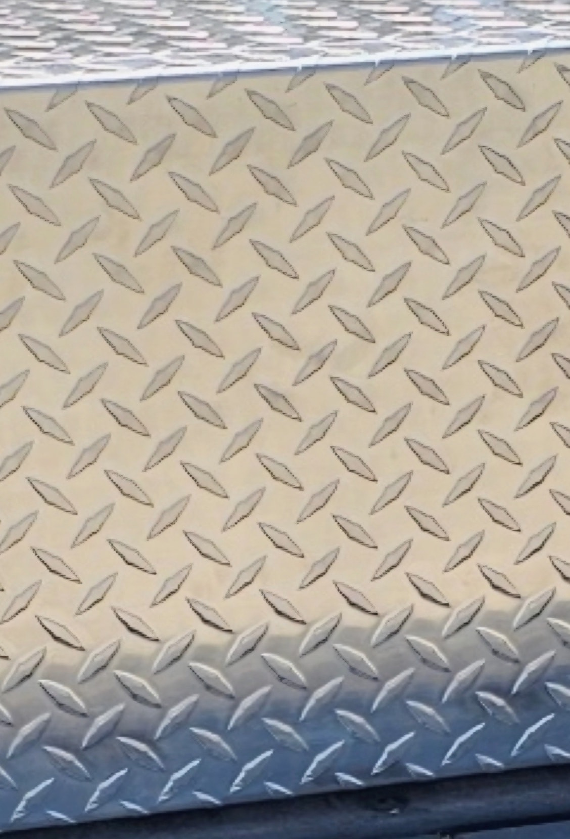 Diamond plate steel texture close up